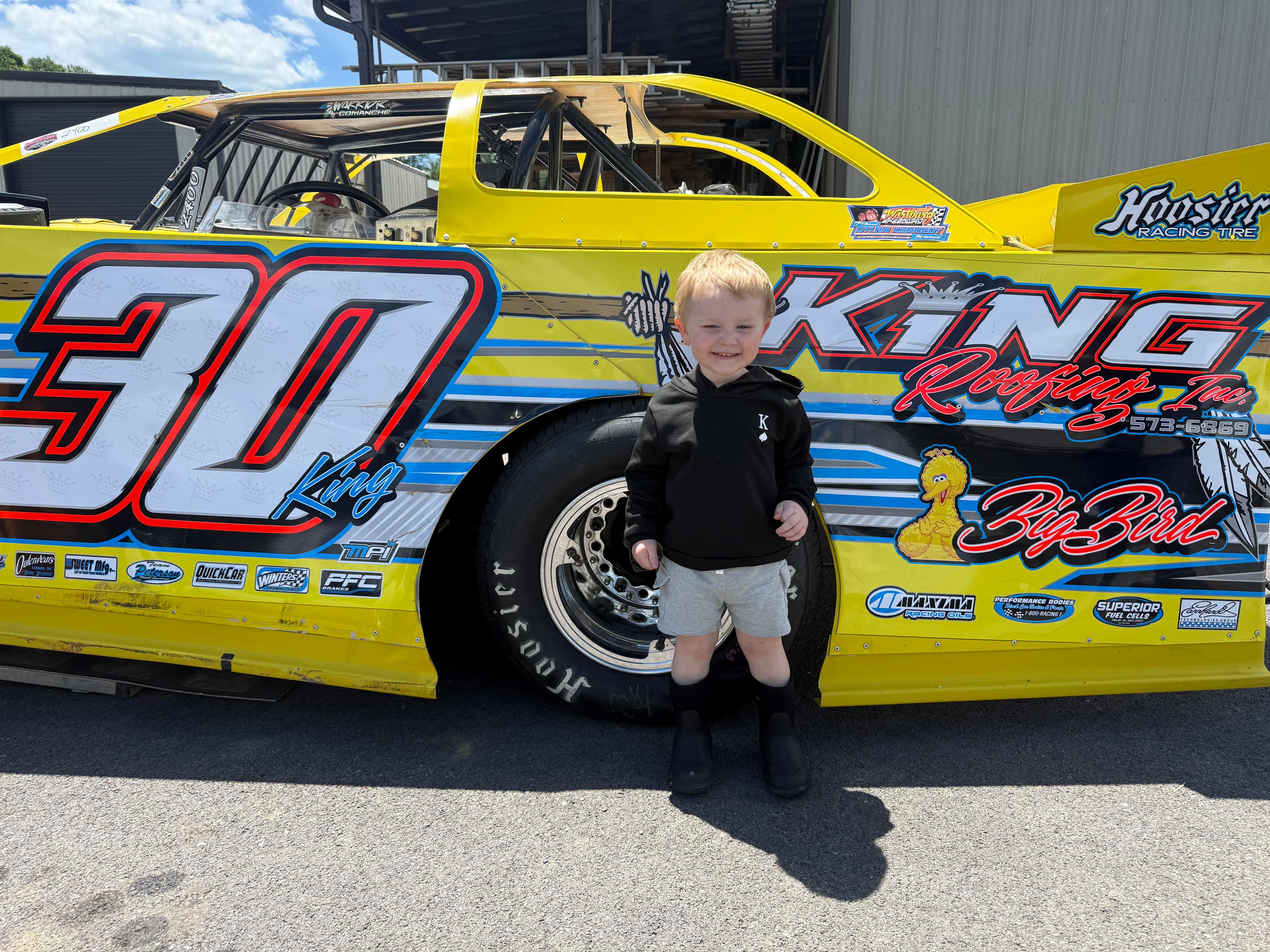 Kamden at the shop with the #30